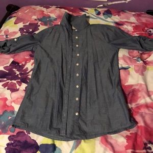 Blue jean button down shirt.